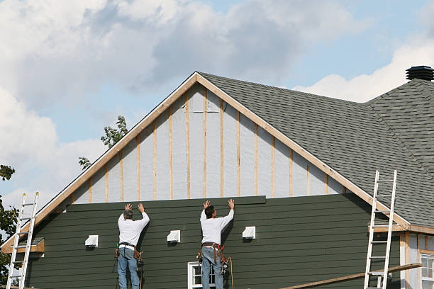 Professional Siding Installation technician working in Baring, WA